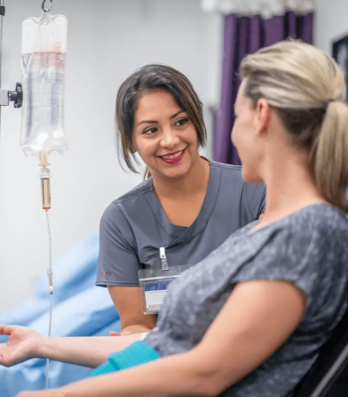 women taking Migraine Relief IV Therapy from IV specialist