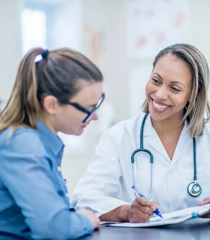 Doctor talking with patient about Toxin Flush