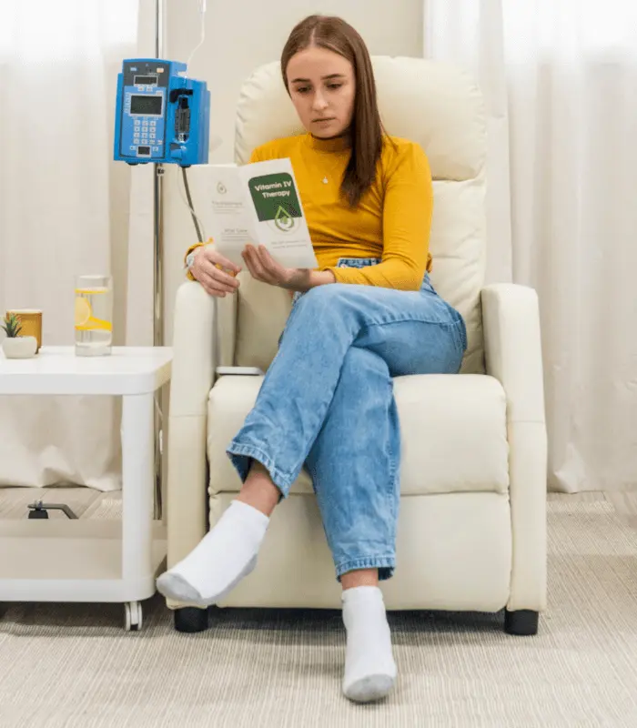 One young women taking NAD+ IV Therapy
